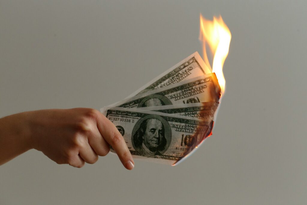 burning US banknotes